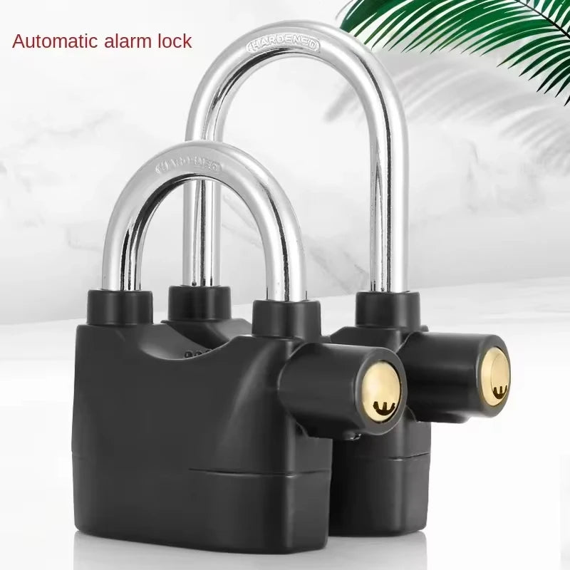 Black and silver automatic alarm lock on a white background