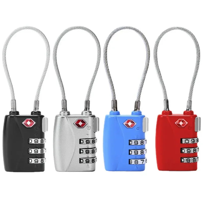 Four colorful combination locks with cable on a white background