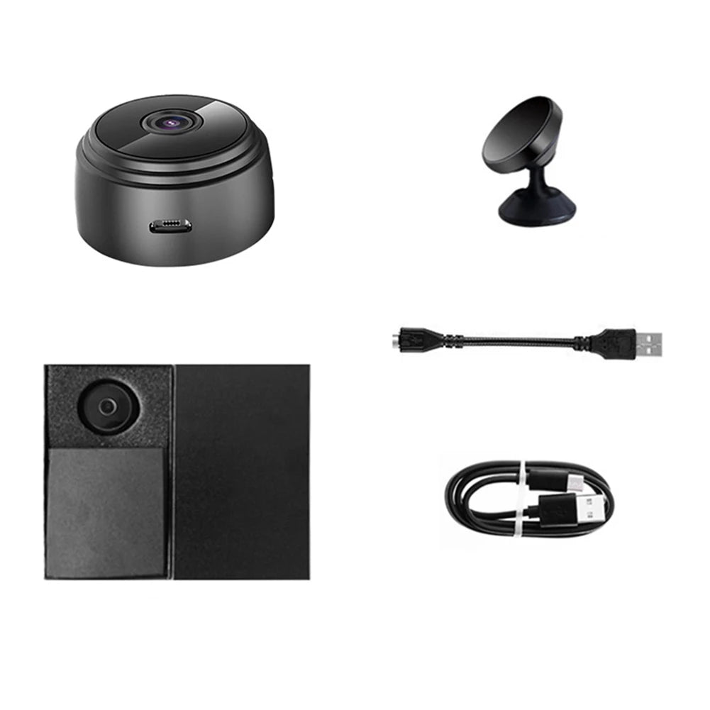 Set of black electronic devices including a camera, power adapter, and cables on a white background