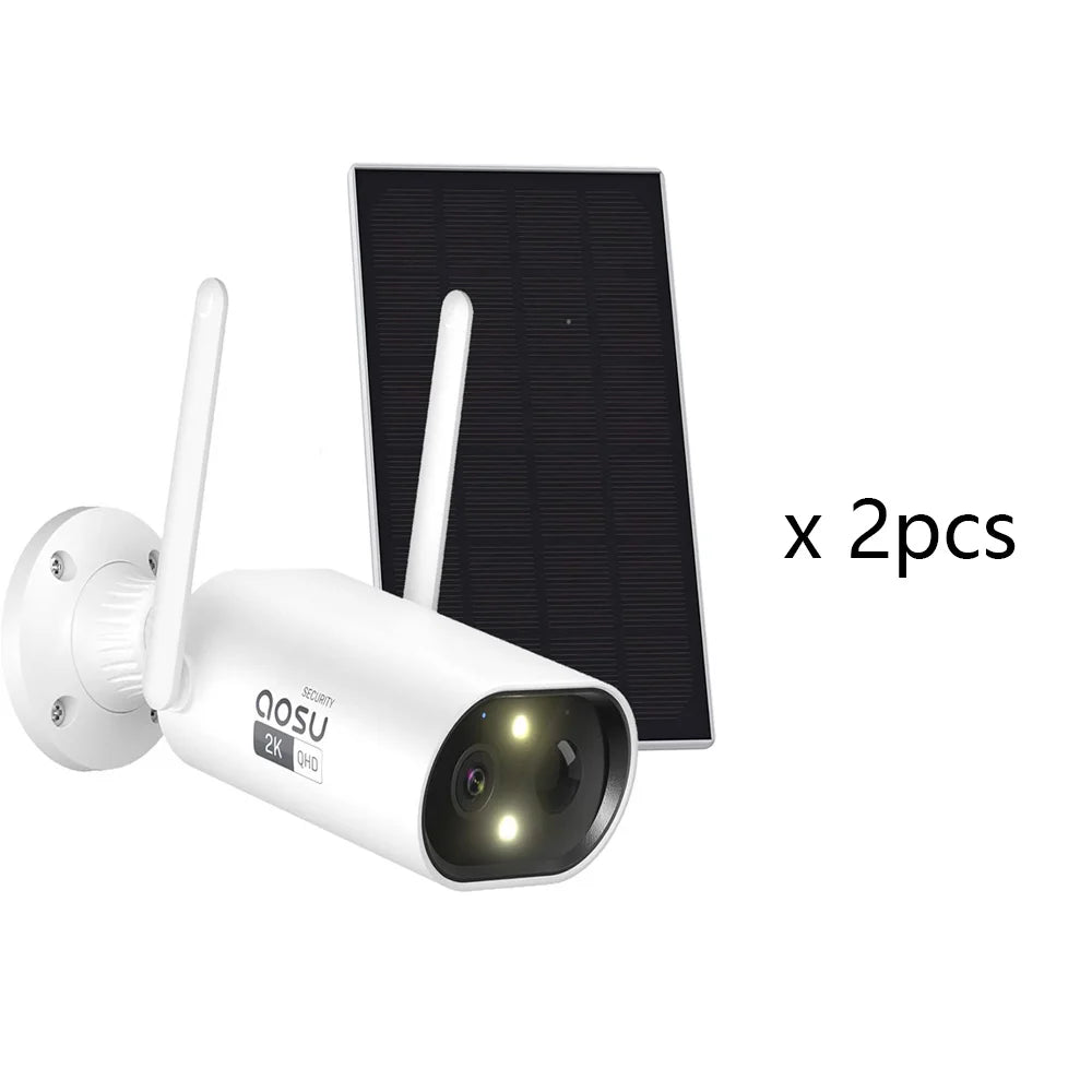 White security camera with antennas and a solar panel on a white background